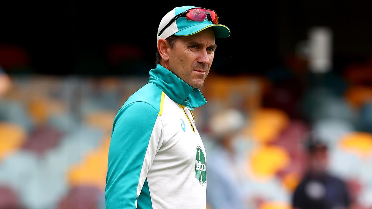 Justin Langer is feeling the heat